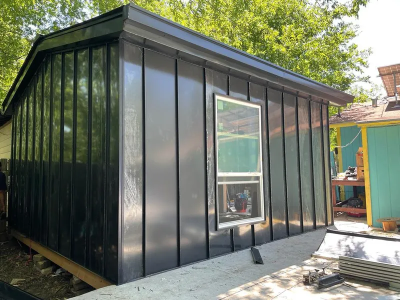 Black standing seam metal wall panels for Metal Roof Installation in Sioux Falls