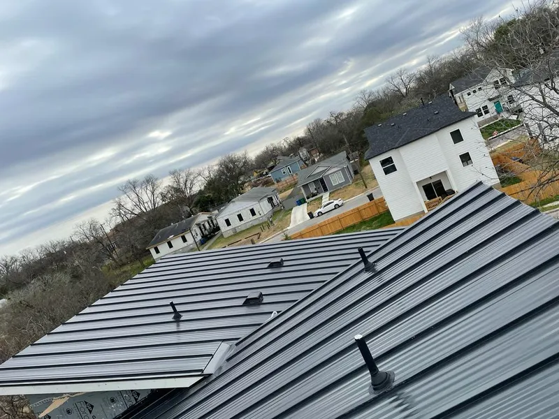 Standing seam metal roof panels with vents for Skylight Repair in Sioux Falls